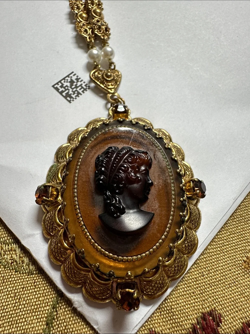 Gold-Tone Amber Cameo Pendant Necklace with Dark Cameo Profile